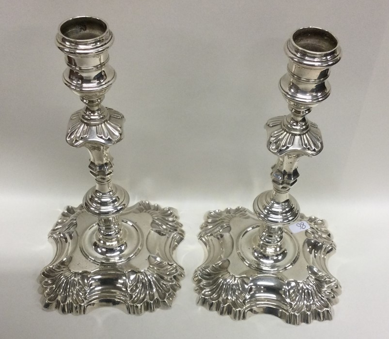 A good pair of Georgian cast silver candlesticks o - Image 2 of 3