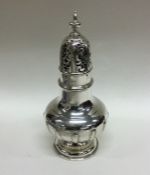 A good quality silver sugar caster of fluted desig