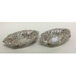 A good pair of silver bonbon dishes with floral de