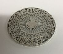 TIFFANY & CO: A circular silver and glass coaster