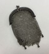 An unusual silver mesh purse of typical design. Ap