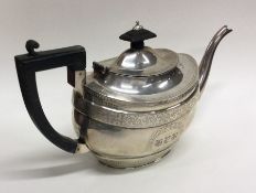 A good Georgian style silver teapot attractively d