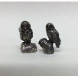 Two good cast silver figures of owls of textured f