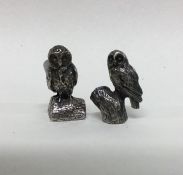 Two good cast silver figures of owls of textured f