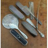 A silver backed hand mirror, button hook etc. Vari