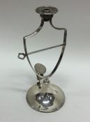 A rare Georgian silver wax jack of typical form wi