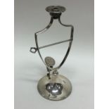 A rare Georgian silver wax jack of typical form wi