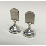 A good pair of silver menu holders of tapering for