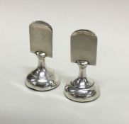A good pair of silver menu holders of tapering for