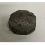 A Chinese shaped silver box with hinged side. Appr