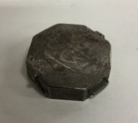 A Chinese shaped silver box with hinged side. Appr