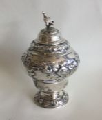 A good heavy George II silver pear shaped tea cadd