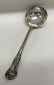 A good Kings' pattern silver ladle. London. By EE.