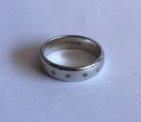 A good diamond six stone plain half eternity ring