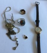 A small gold wristwatch together with other costum