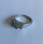 A diamond twelve stone princess cut cluster ring i