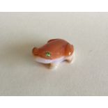 A small hardstone figure of a frog with faceted ey