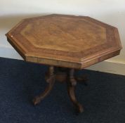A Victorian centre table with mahogany inlay on fo