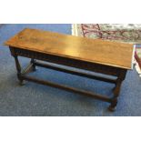 A good carved oak side table on turned supports wi