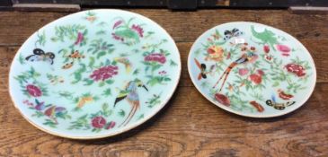 Two Chinese Canton plates. Est. £20 - £30.