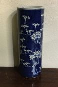 A tall blue and white Chinese vase of typical form