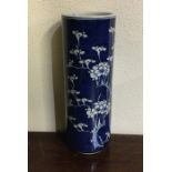 A tall blue and white Chinese vase of typical form