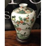 A Chinese baluster shaped vase decorated with flow