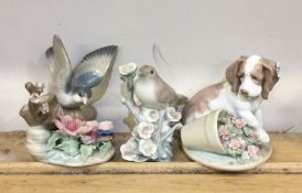 Two Lladro figures of birds together with one of a