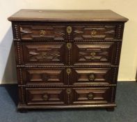 A good early Georgian chest of four long drawers w