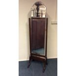 A mahogany dressing mirror on cabriole supports. E