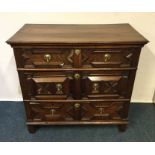 A good early Georgian chest of three long drawers