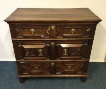 A good early Georgian chest of three long drawers