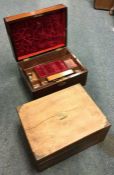 Two rosewood jewellery boxes. Est. £30 - £50.