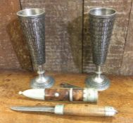 An Antique hardwood dagger together with goblets.