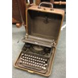 A cased typewriter by Royal. Est. £20 - £30.