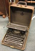 A cased typewriter by Royal. Est. £20 - £30.