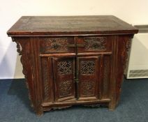 A Continental hardwood altar table of tapering for