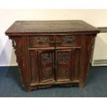 A Continental hardwood altar table of tapering for