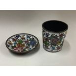 An attractive Continental enamelled beaker togethe
