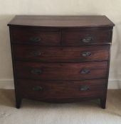 A good mahogany five drawer bow front chest on spr