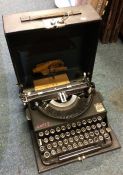 A cased Imperial travelling typewriter. Est. £30 -