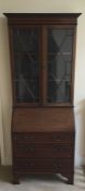 A good early Edwardian mahogany bureau bookcase wi