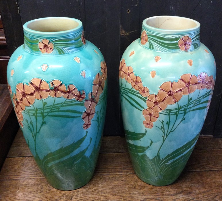 A pair of large tapering floral vases. Approx. 46