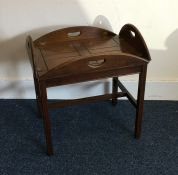 A mahogany butler's tray on stand. Est. £20 - £30.