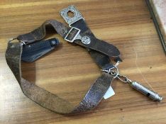 An old Girl Guide's leather uniform belt and pocke