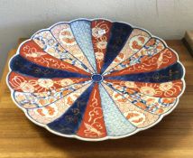 A large circular Chinese Imari charger. Est. £20 -