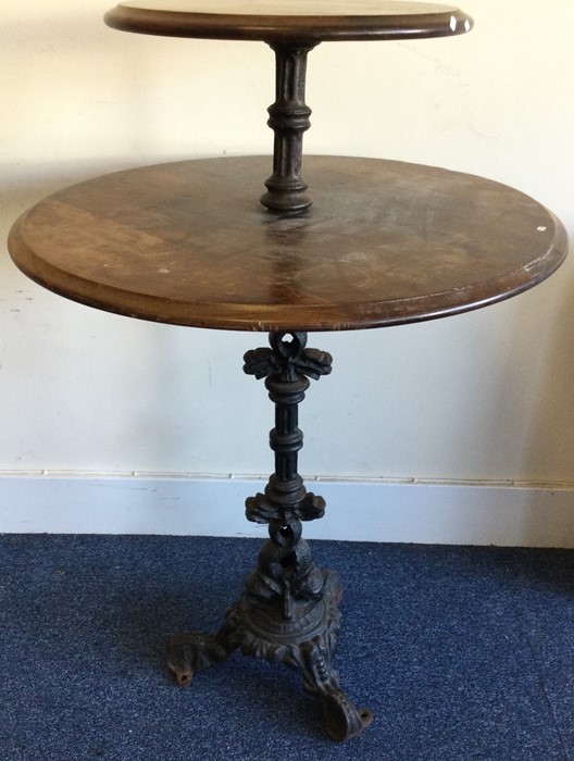 A large cast iron two tier drink's table of circul - Image 2 of 2