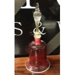 A large cranberry glass bell of typical form. Appr