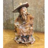A root wood figure of an Oriental man. Est. £20 -