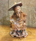 A root wood figure of an Oriental man. Est. £20 -